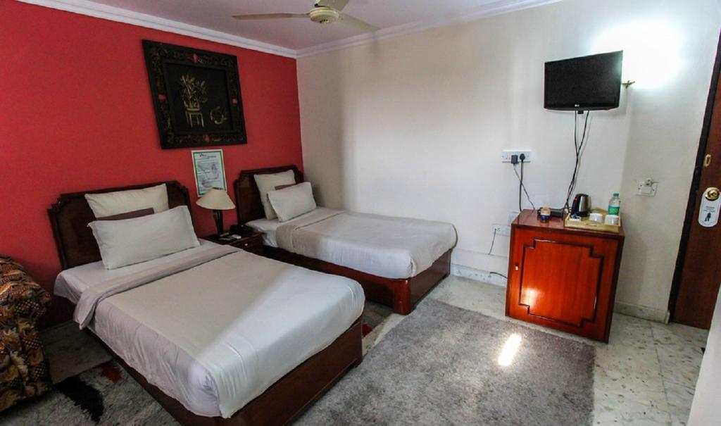 Hotel Pigeon International Bangalore Quarto foto