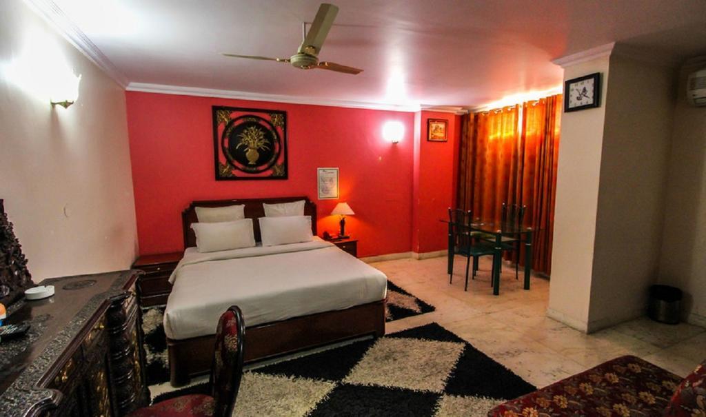 Hotel Pigeon International Bangalore Quarto foto